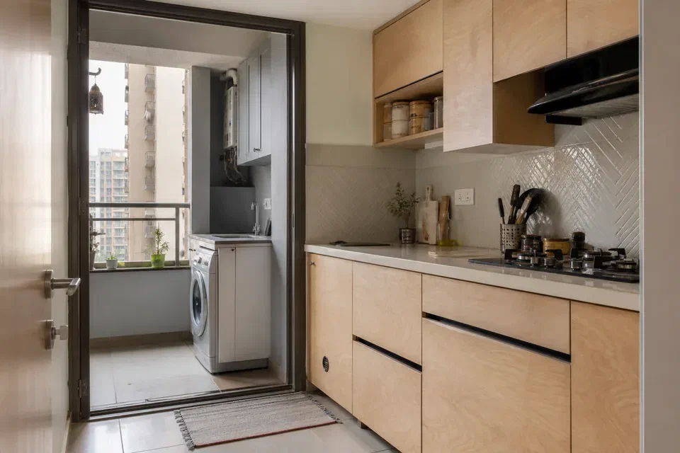 Illustrative hybrid main kitchen and aluminium utility cabinet material zoning in Gurugram