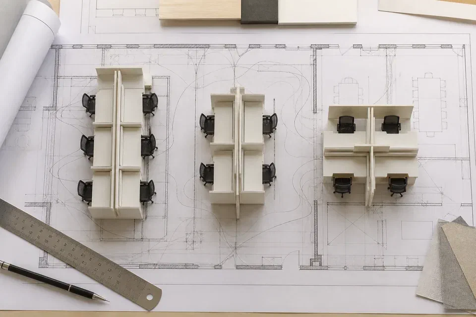 Illustrative WoodAge linear back-to-back and four-person workstation modules with aisle and floor-box positions in Gurugram